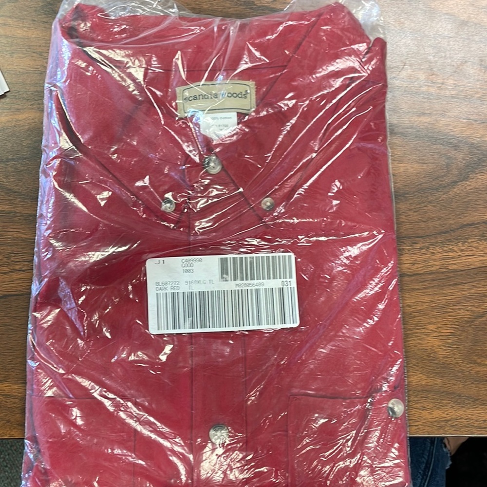 Red button down shirt. Long sleeve